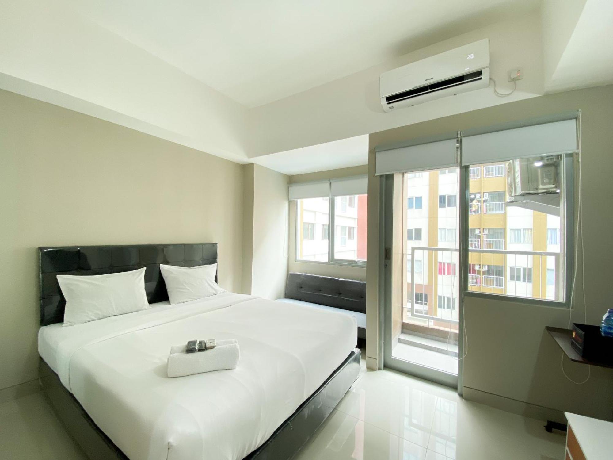 Homey And Cozy Gateway Park Lrt By Travelio * Bekasi